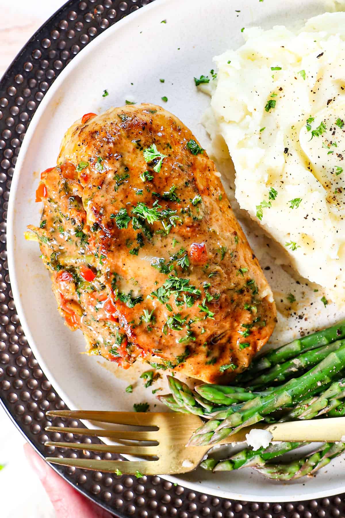 top view of serving stuffed chicken breast recipe on a plate