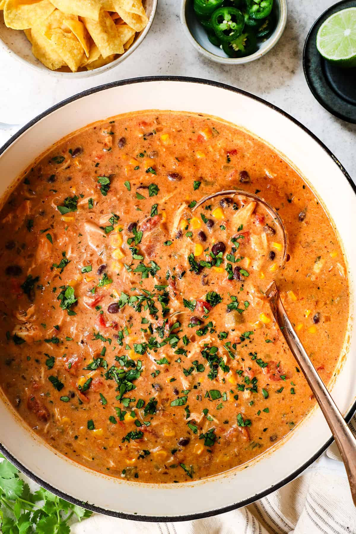top view of a pot of chicken taco soup recipe showing garnished with cilantro