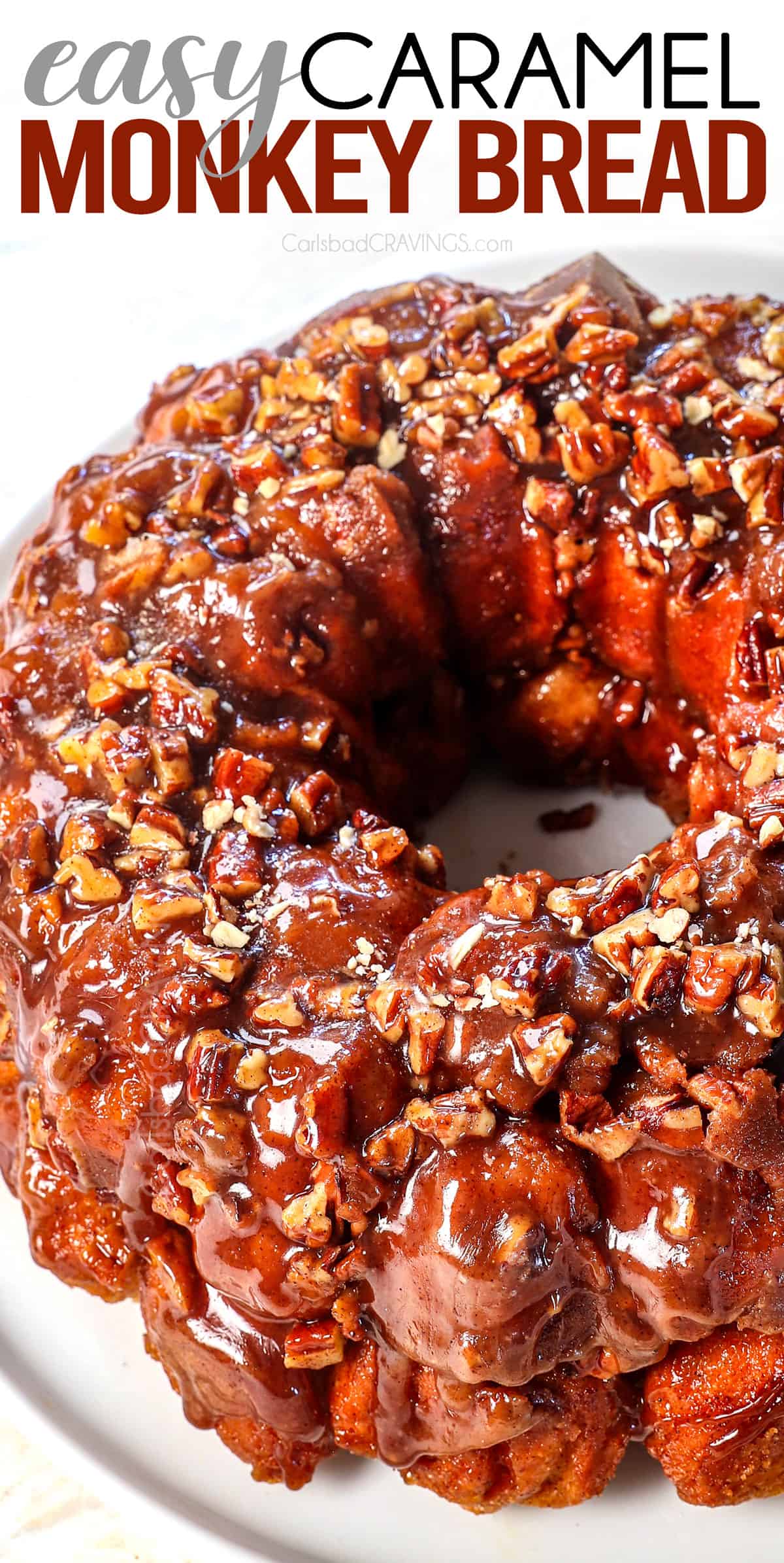 up close of monkey bread on a platter showing the sticky caramel glaze