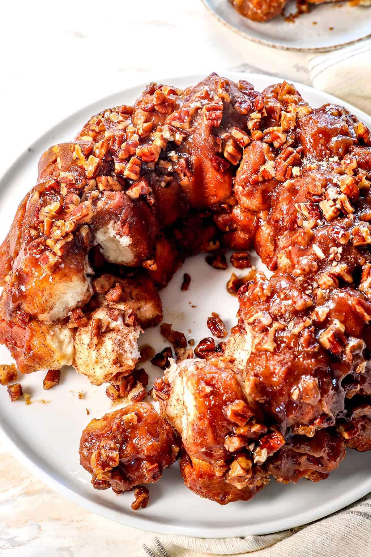 showing monkey bread recipe with some pieces removed showing how soft and fluffy the balls are