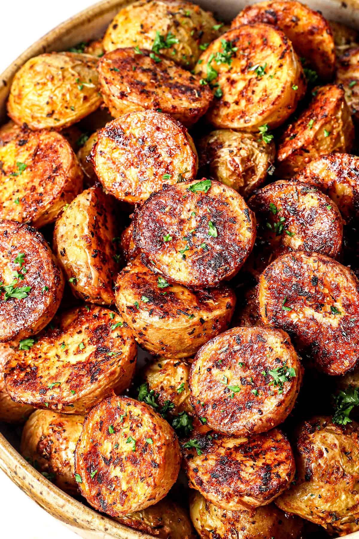 best roasted potatoes in a bowl with Parmesan