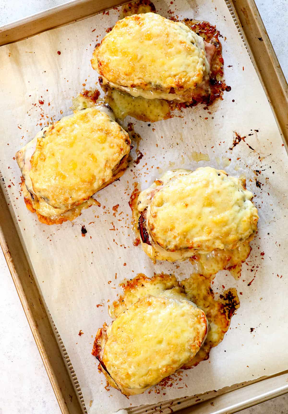 showing how to make croque monsieur recipe by baking until the cheese has melted, then broiling