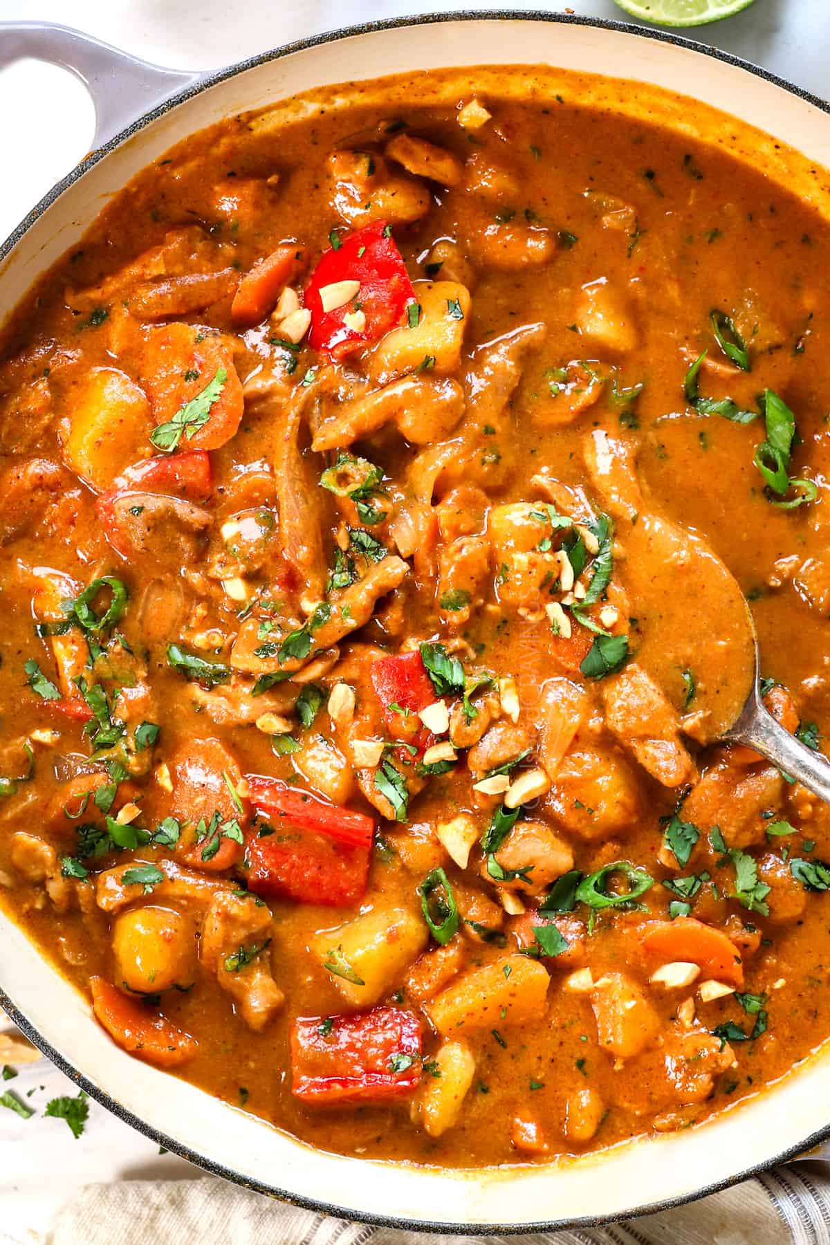massaman curry in a braiser showing how rich and creamy it is
