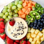 top view of fruit dip recipe served on a platter with a variety of fruits