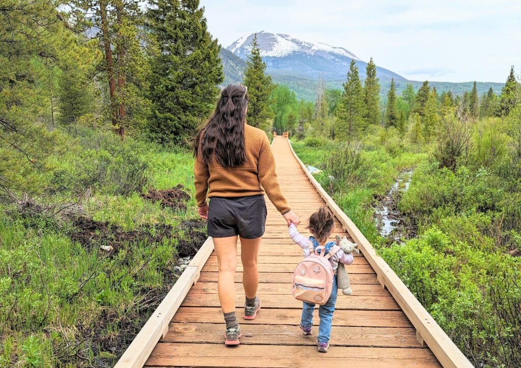 picture of me and my daughter on a hike. How I’m Working Just a Few Hours a Week This Summer (And Still Earning Full-Time Income)