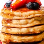 up close of pancakes in a stack showing how fluffy they are
