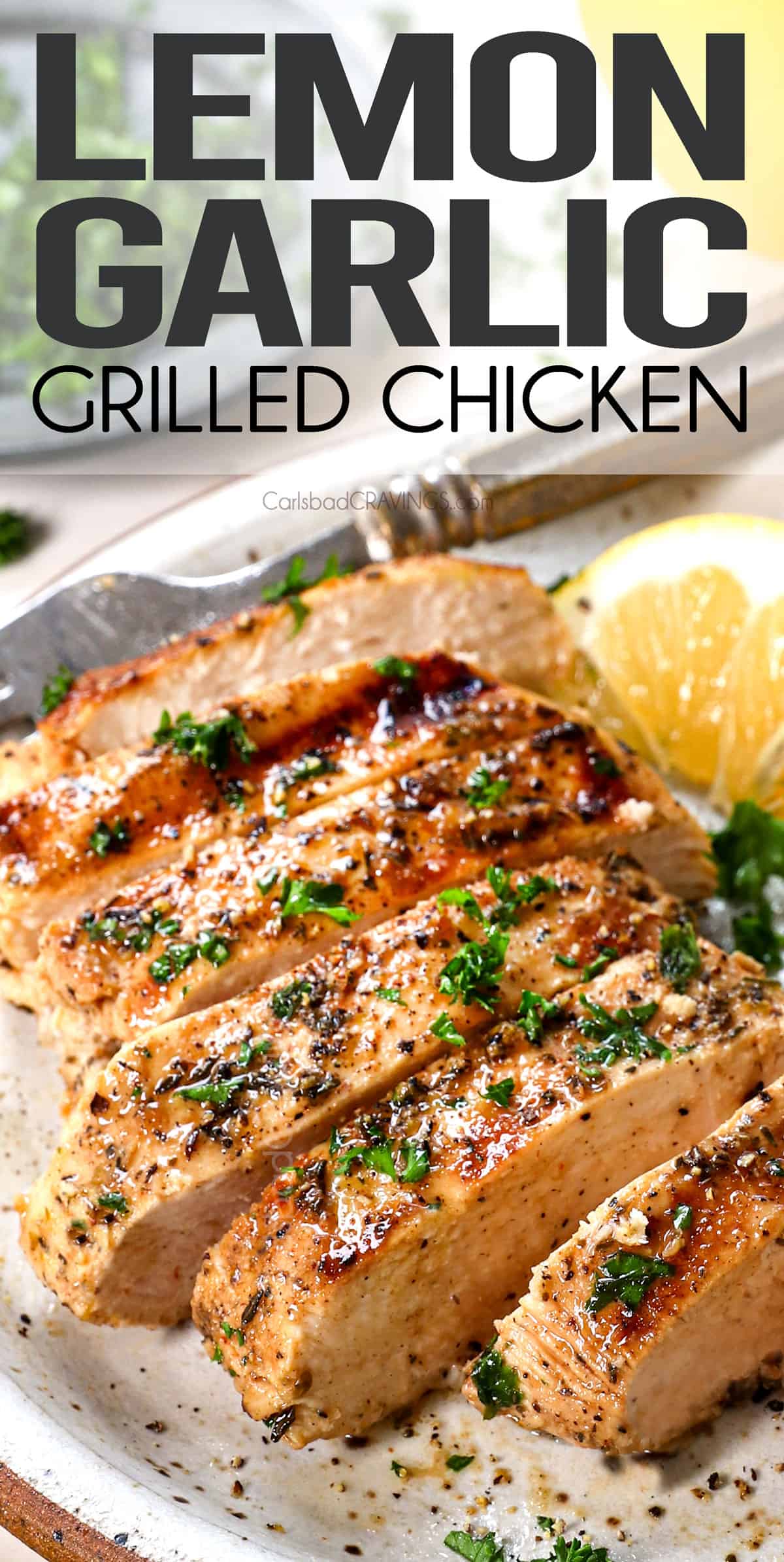 up close of grilled chicken sliced on a plate showing how juicy it is