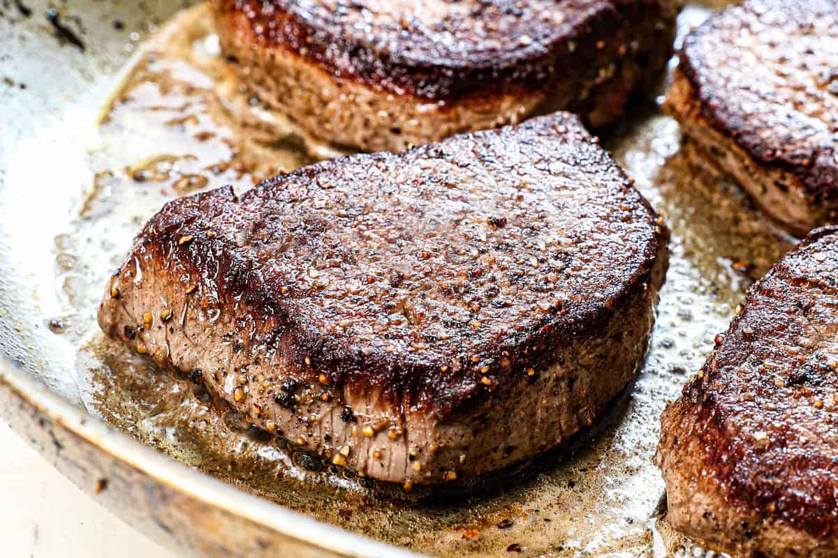 showing how to make Steak Diane by pan searing the steaks in a skillet