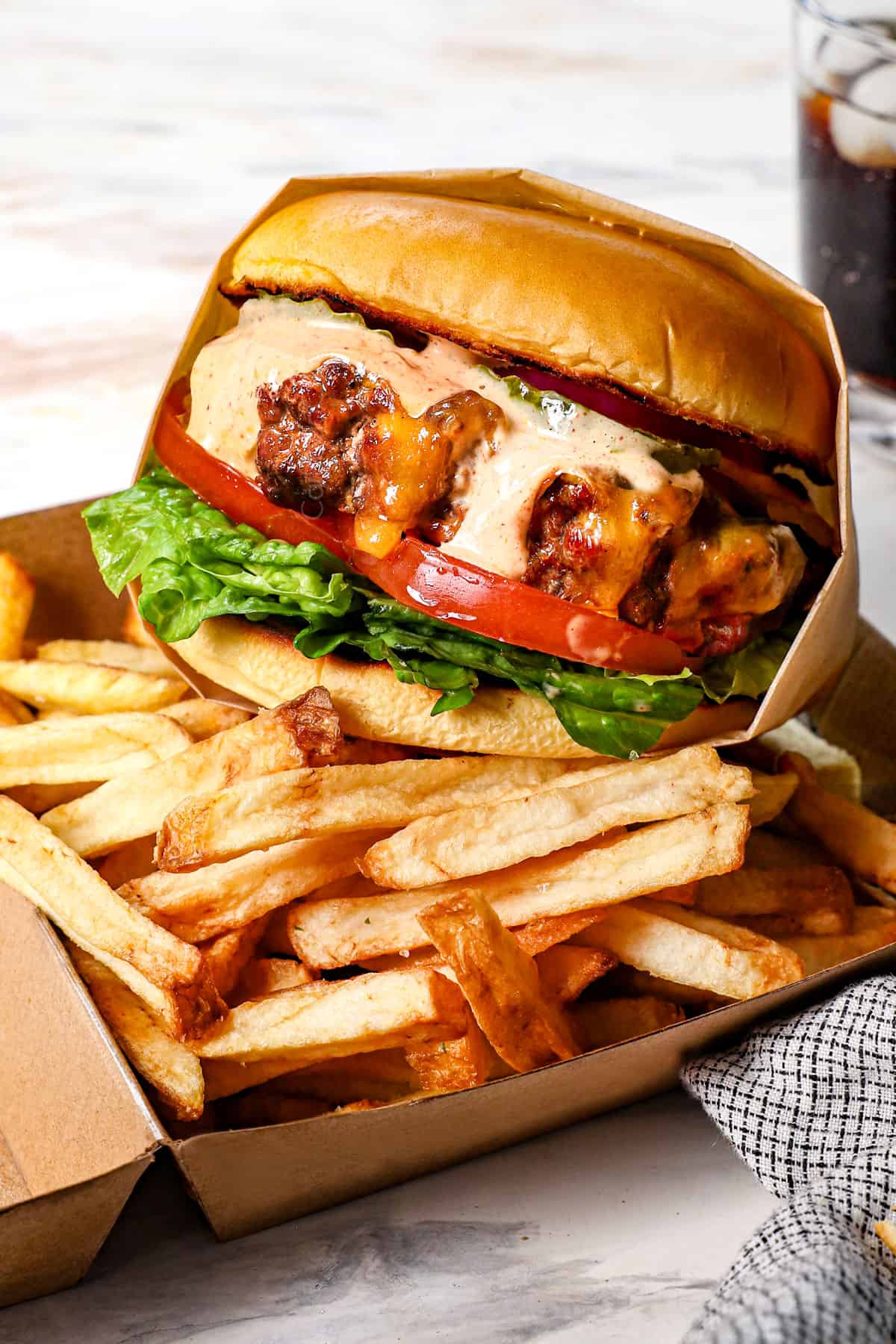 best cheeseburger recipe being served with fries