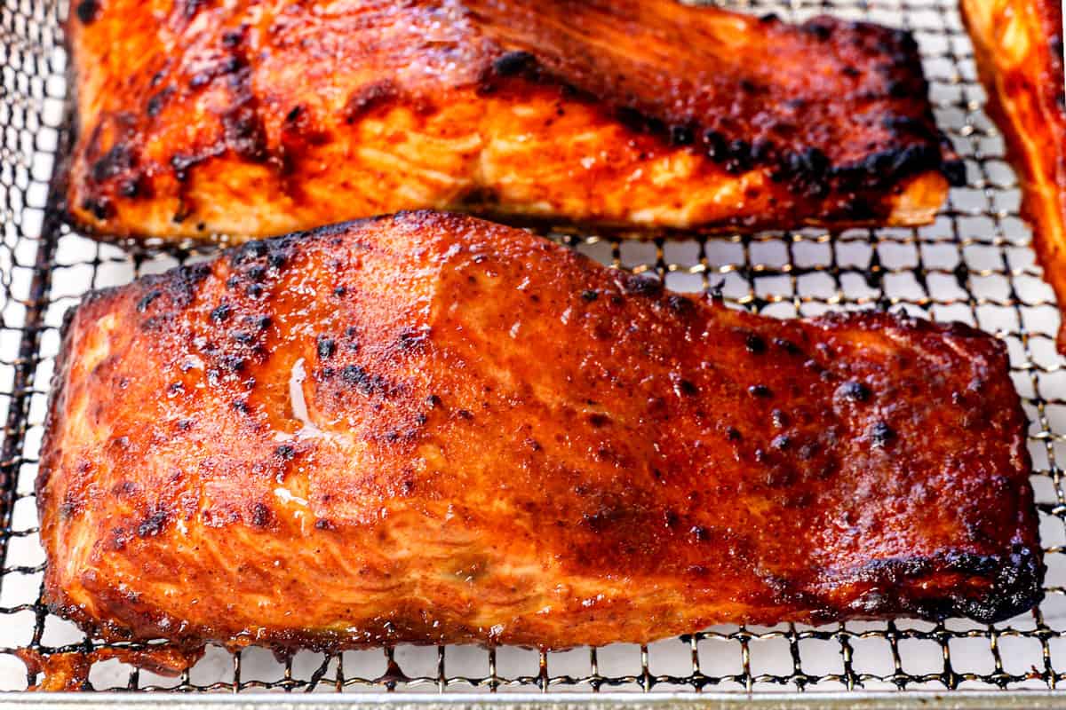 showing how to air fry salmon by air frying until caramelized on the outside and juicy on the inside