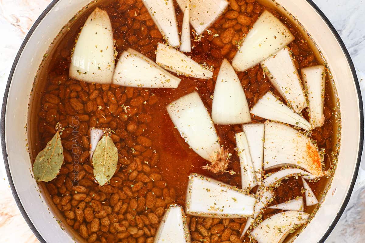 showing how to make refried beans by simmering the beans until tender
