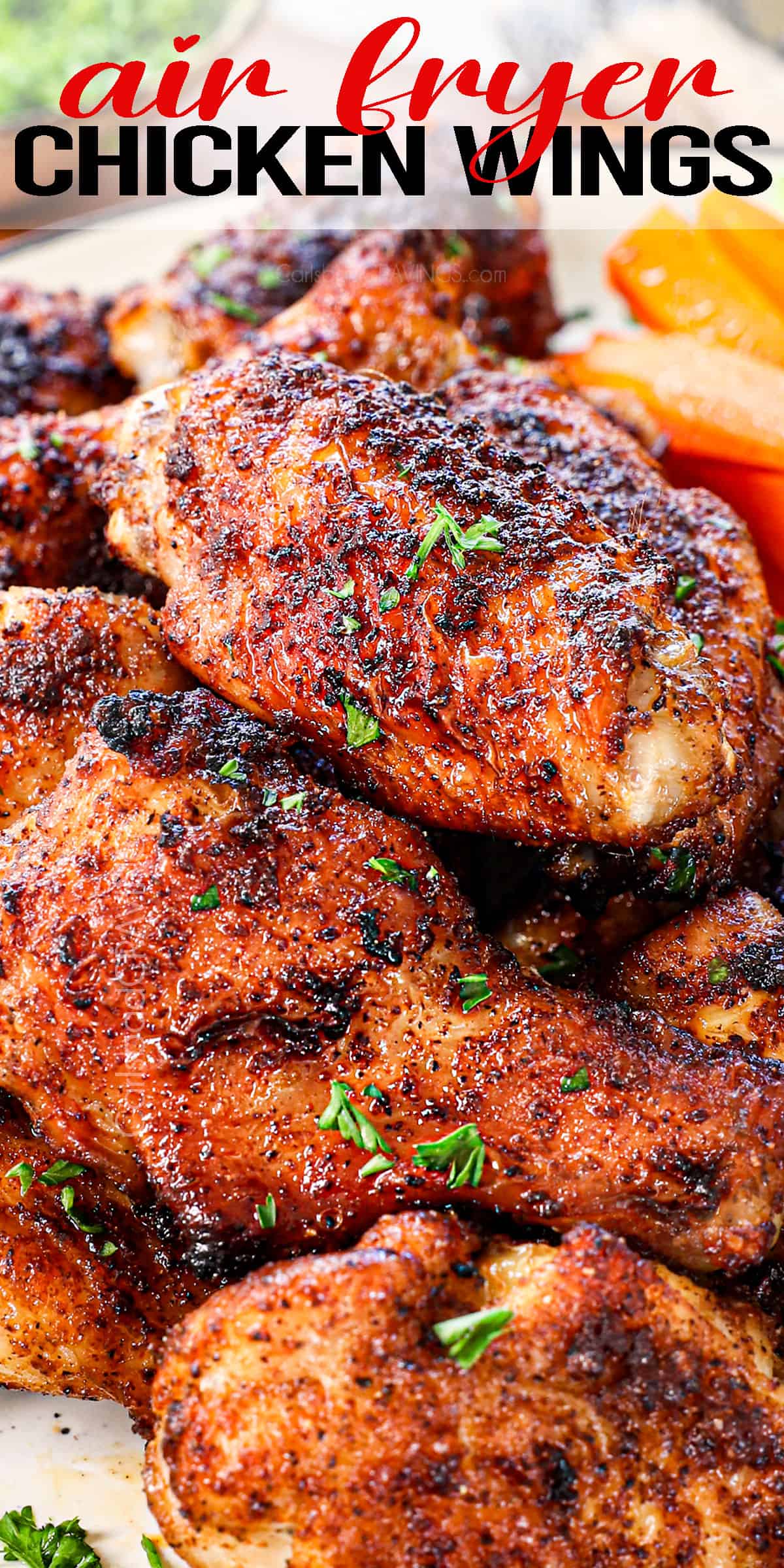 up close of chicken wings in air fryer showing how crispy they are