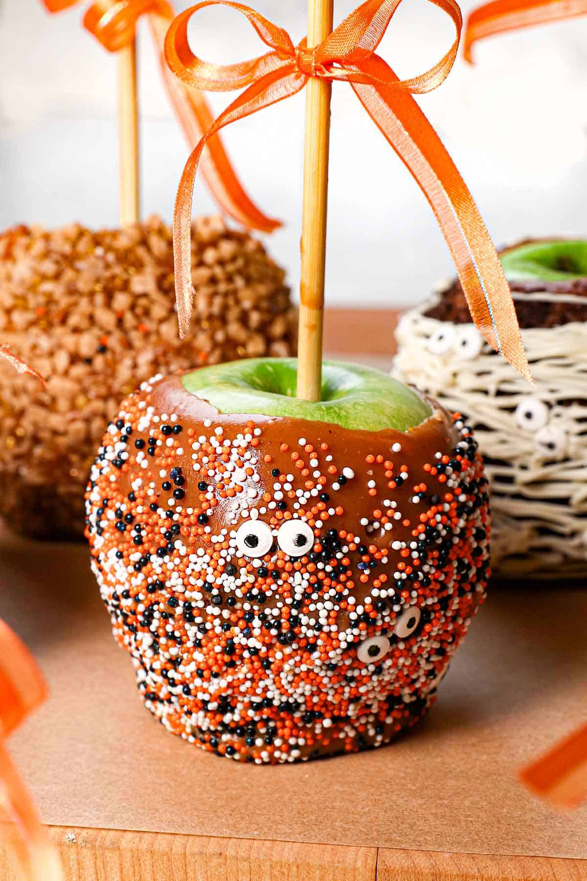 up close of caramel apple recipe decorated with sprinkles