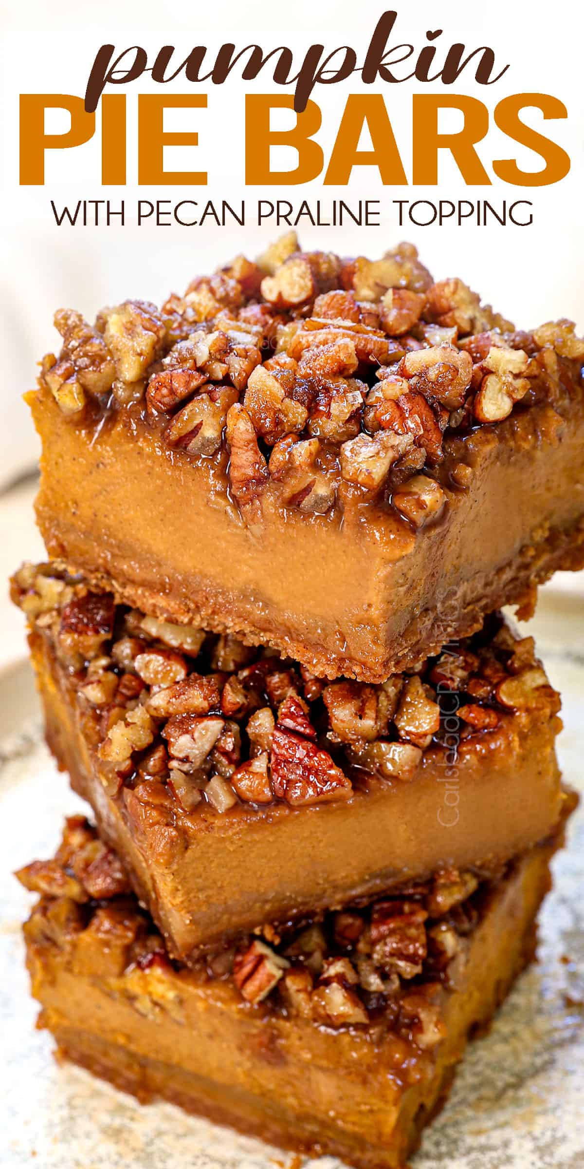 a stack of pumpkin pie bars showing how creamy the filling is