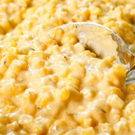 up close of stirring creamed corn showing how creamy it is