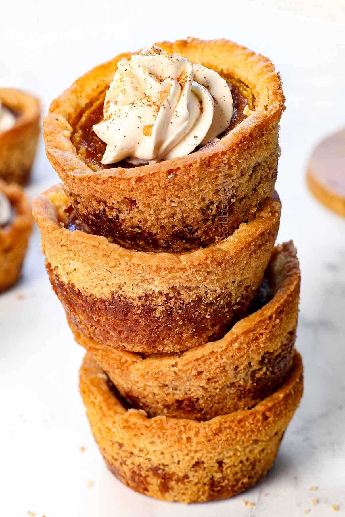 a stack of mini pumpkin pies made with sugar cookie crusts